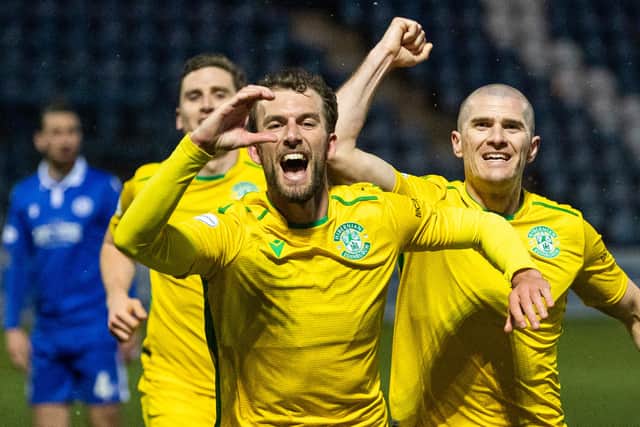 Christian Doidge celebrates his opener with a tribute to Lee Collins