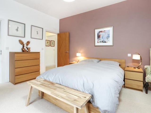 All three bedrooms are of a similar size, although this is considered to be the main one. Bright and comfortable. it boasts an en suite shower room to the left.