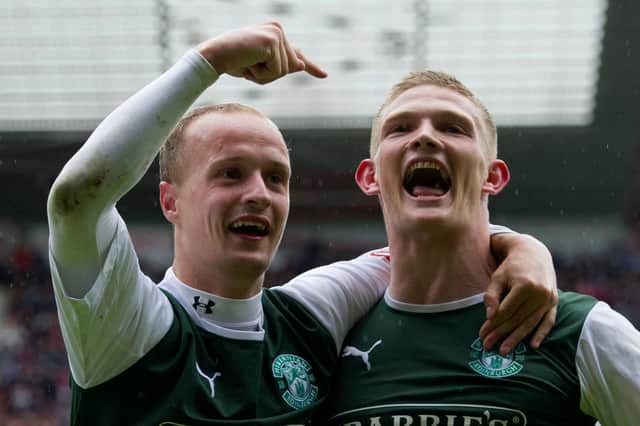 Hibernian star Leigh Griffiths (left) congratulates Ross Caldwell on his late goal in the Edinburgh derby at Tynescastle on May 12, 2013.