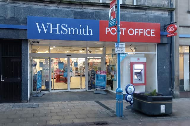 Many of the WH Smith high street stores, including this one in Dunfermline, house a Post Office branch, and remain open throughout lockdown. Picture: Scott Reid