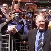 Scotland coach Craig Brown salutes the fans at the Stade de France before the opening match of the 1998 World Cup between Brazil and Scotland