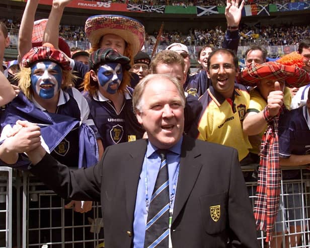 Scotland coach Craig Brown salutes the fans at the Stade de France before the opening match of the 1998 World Cup between Brazil and Scotland