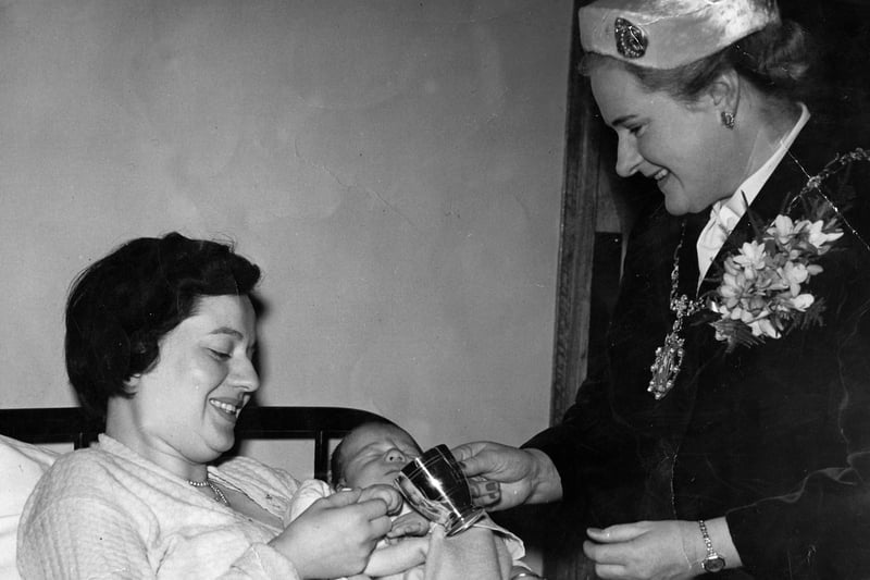 Freda Wilson, of Bridge Street, Musselburgh and her son Les who was born on Christmas Day 1953, also in the picture is Edinburgh's Lady Provost Miller.