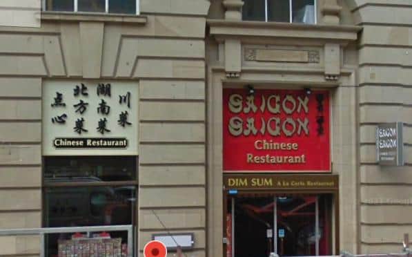 A boss at the popular restaurant Saigon Saigon has been charged