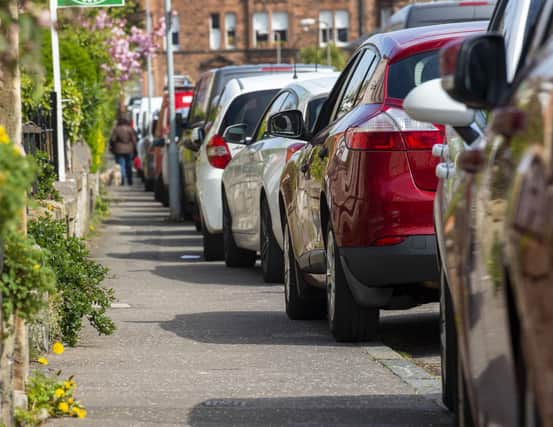 A complete ban on parking on pavements will come into force in Edinburgh in January (Picture: Lisa Ferguson)
