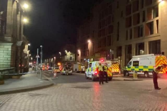 Multiple ambulances, police cars, and fire engines were photographed at the scene just after midnight.