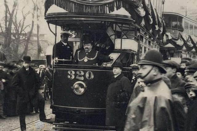 Louis Bruce pictured at the front of the tram. Photograph: London Transport Museum