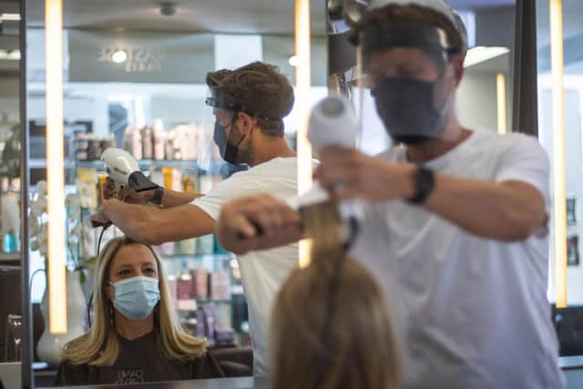 Hairdressers and barbers can reopen in Scotland from Monday as further coronavirus restrictions are lifted.