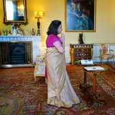 Queen Elizabeth II appears on a screen via videolink from Windsor Castle, where she is in residence, during a virtual audience to receive the High Commissioner of India, Ms. Gaitri Issar Kumar, at Buckingham Palace, London. Picture date: Tuesday March 8, 2022.