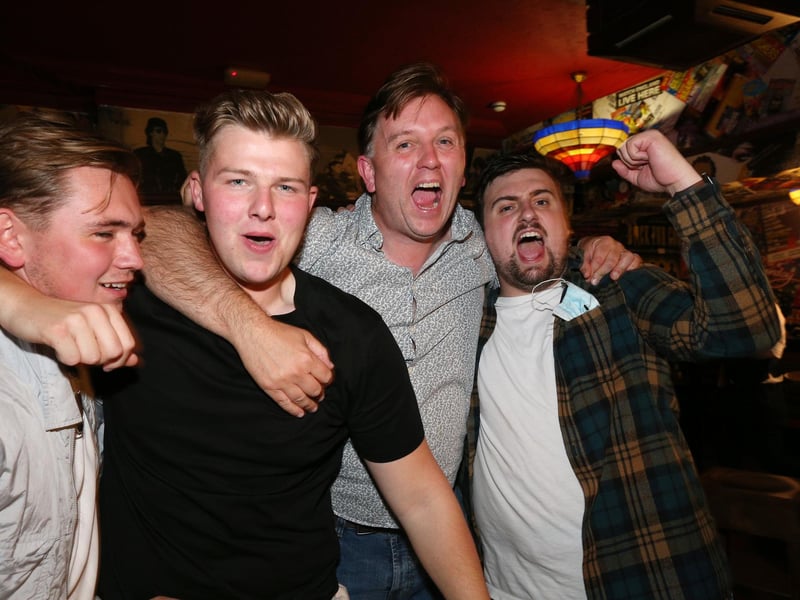 Celebrations at full-time. Fans watch England v Ukraine in the quarter finals of Euro 2020, in The Kings pub, Albert Rd, Southsea. Picture: Chris Moorhouse (jpns 030721-20)