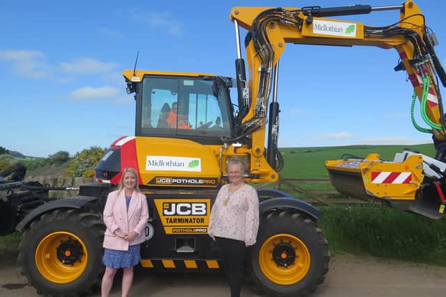 Council leader Kelly Parry and Provost Debbi McCall with 'The Tarminator'