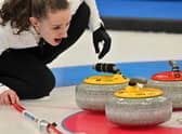 Jenn Dodds curls the stone during the final mixed doubles round robin session ahead of the semi-final against Norway