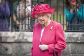 Queen Elizabeth II at the gates at Balmoral, as she takes up summer residence at the castle.
