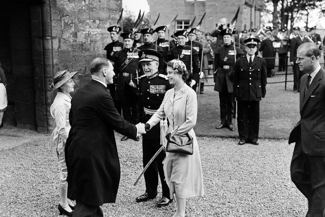 Queen Elizabeth II at Linlithgow on her tour of West Lothian in 1955 meeting local dignitaries.