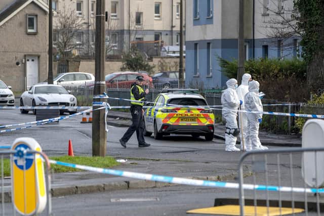 Police have arrested two people in connection with the fatal shooting on New Year's Eve. Jane Barlow/PA Wire