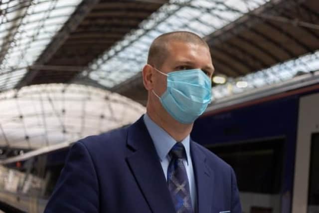 The rail operator has urged passengers and customers to keep wearing face coverings.