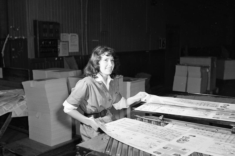 Thomas Nelson and Sons Printing Factory  Edinburgh - Miss Jamieson puts sheets into the automatic folding machine