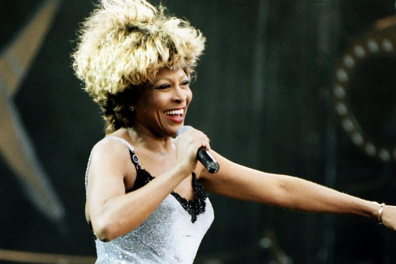 Tina Turner smiles at the crowd during her concert at Murrayfield in Edinburgh in 1996, where she performed some of her biggest hits, including The Best, GoldenEye, What's Love Got to Do With It?, Private Dancer and Proud Mary, as well as an interesting cover of Massive Attack song Unfinished Sympathy.