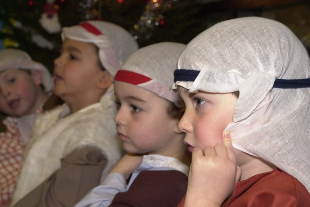 Here the children of the Thistle class at Mary Erskines and Stewart’s Melville Junior School are getting ready for their nativity performance. Picture: 8 December 2000.