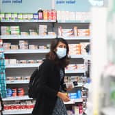 Wearing face masks is now mandatory in shops and on public transport and is advised in other situations where social distancing is difficult (Picture: Victoria Jones/PA Wire)