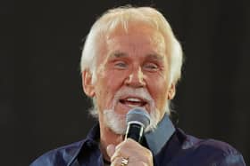 Kenny Rogers' hit The Gambler could provide the background music for the planning committee in the city chambers