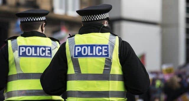 Police descended on a West Lothian town after residents reported seeing a man with a ‘bladed weapon’ in the street.