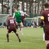Robbie Hamilton leaps to head home Hibs' second from Oscar MacIntyre's cross. Picture: Maurice Dougan