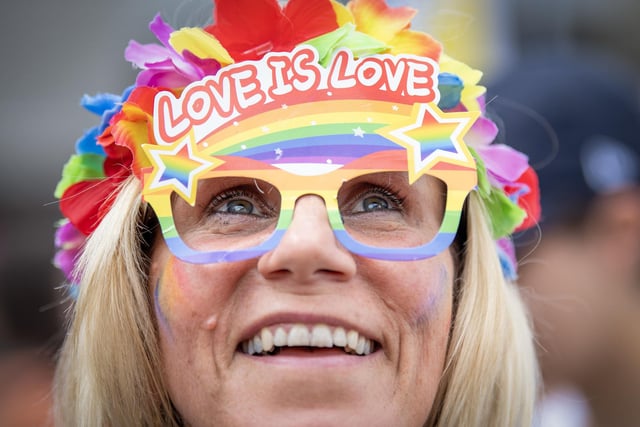 'Love is Love' banner on glasses captures the spirit of Pride. Photo: Lesley Martin/PA Wire
