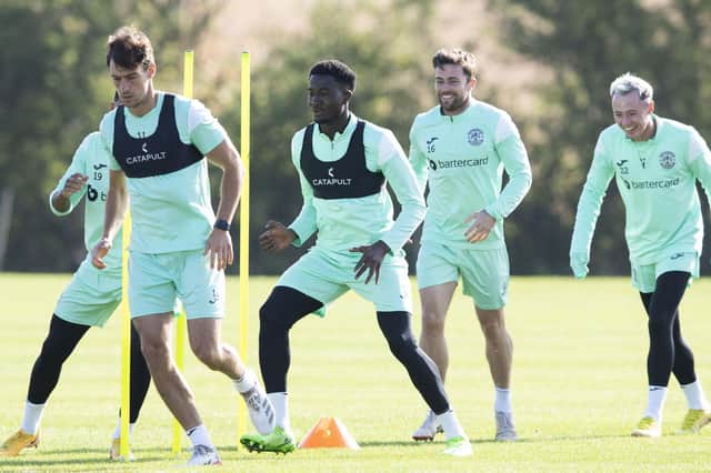 Nohan Kenneh, second left, pictured in training with his Hibs team-mates