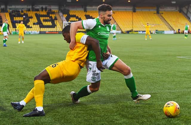 Darren McGregor gets to grips with Livingston captain Marvin Bartley during the last trip to West Lothian