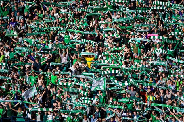 Hibs supporters celebrate at Hampden Park after their side defeated Rangers in the 2016 Scottish Cup final. Picture: SNS