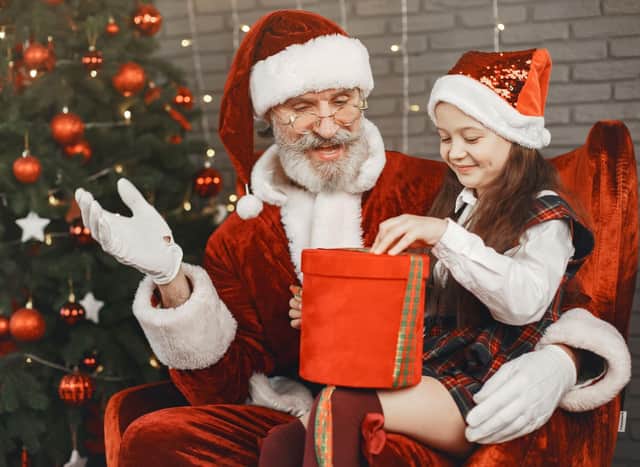 Meet Santa and come away with a festive gift all of your own. Photo: Yuganov Konstantin / Canva Pro.