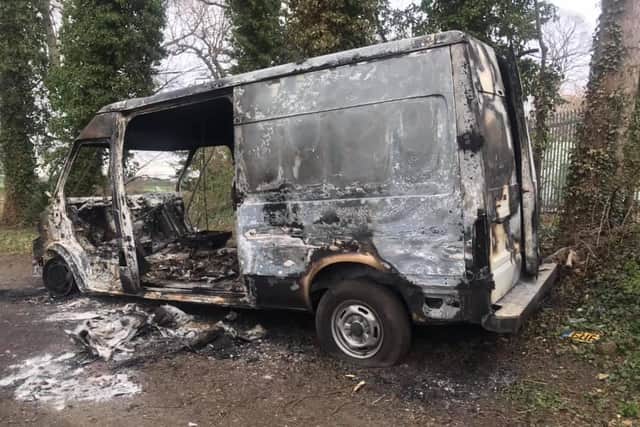 The burnt out van in Hunter's Hall Park, Niddrie.