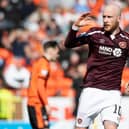 Liam Boyce celebrates his equaliser on the stroke of half time at Tannadice as Hearts fought back to beat Dundee United 3-2