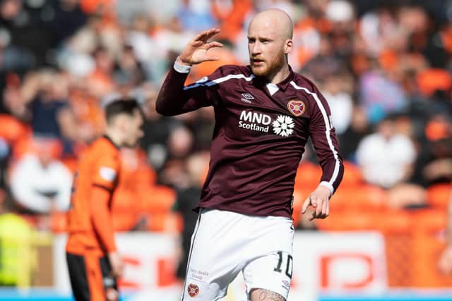 Liam Boyce celebrates his equaliser on the stroke of half time at Tannadice as Hearts fought back to beat Dundee United 3-2