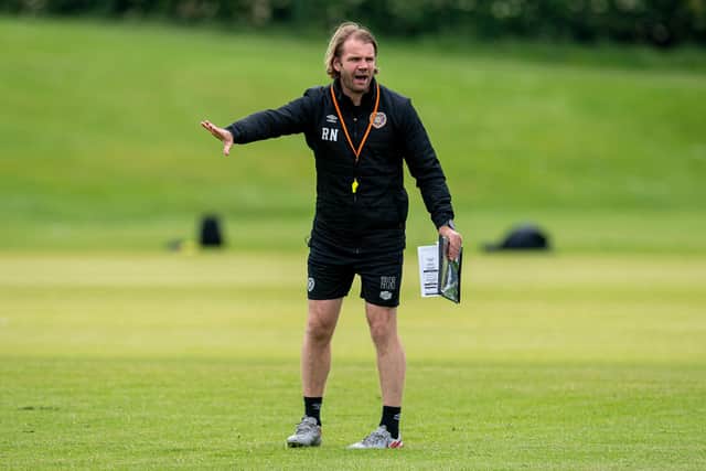 Hearts boss Robbie Neilson has implemented a back three to good success. (Photo by Ross MacDonald / SNS Group)