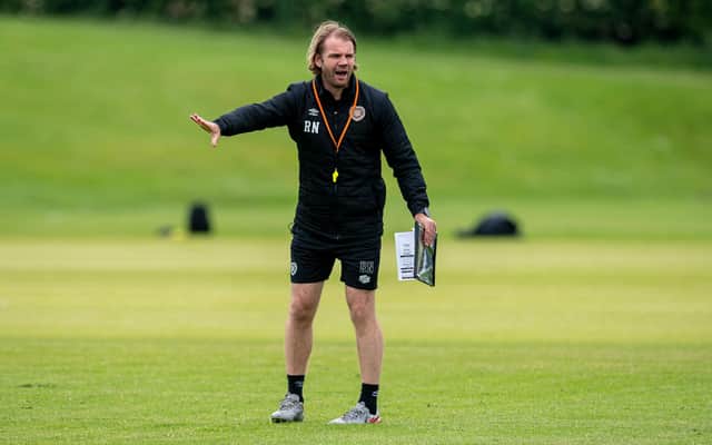 Hearts boss Robbie Neilson has implemented a back three to good success. (Photo by Ross MacDonald / SNS Group)