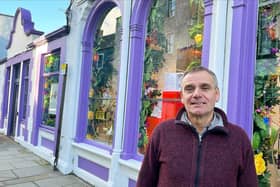 Boe Gin director Andrew Richardson has been told to repaint his colourful shop front in South Queensferry