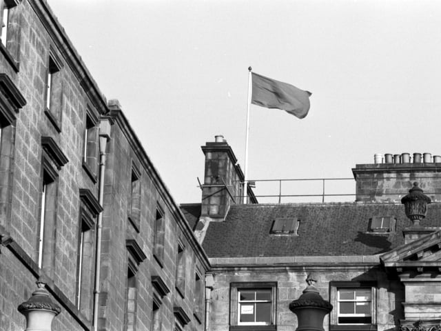 The red flag flies over Edinburgh City Chambers in March 1985.
