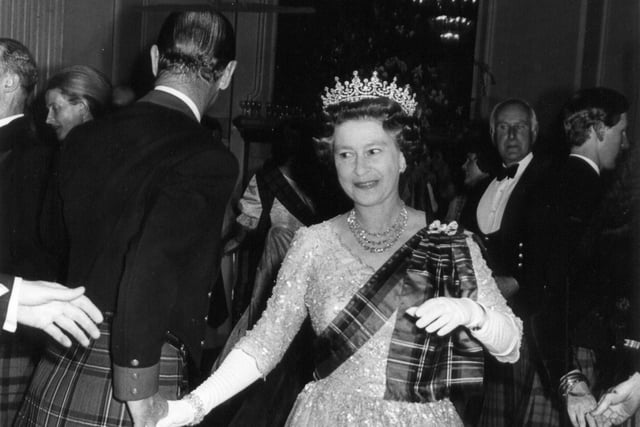 The Queen at the centenary ball of the Royal Scottish Pipers' Society, in Edinburgh, in 1982.