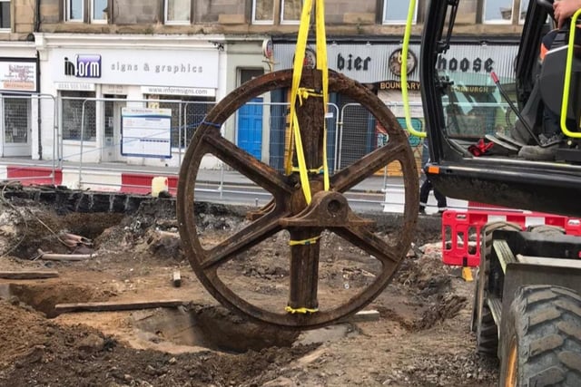 Plans were announced for a large pair of Victorian-era tram cable wheels, part of Edinburgh's original cable-operated tram system, to go on on permanent public display close to today's tram route.  The wheels, dated to 1898, were discovered during work on the extension from the city centre and Newhaven. Measuring 2.6 metres across, they were unearthed at the Pilrig Street junction with Leith Walk, the historic boundary between Leith and Edinburgh.