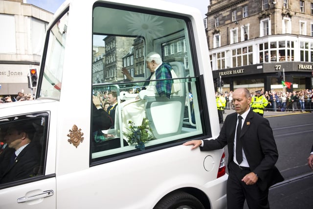 The Popemobile used for his visit to Scotland was a modified Mercedes M-Class vehicle, which cost £75,000, and had the number plate SCV1 - the Italian abbreviation for the Vatican City State.  It had large bullet-proof windows, a security guard sat in the front alongside the driver and there was room for two aides to sit in front of the Pope in his elevated chair.