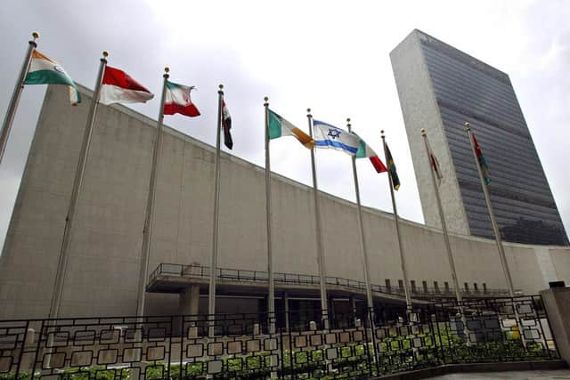 Flags fly outside the United Nations headquarters in New York (Picture: Dom Emmert/AFP via Getty Images)