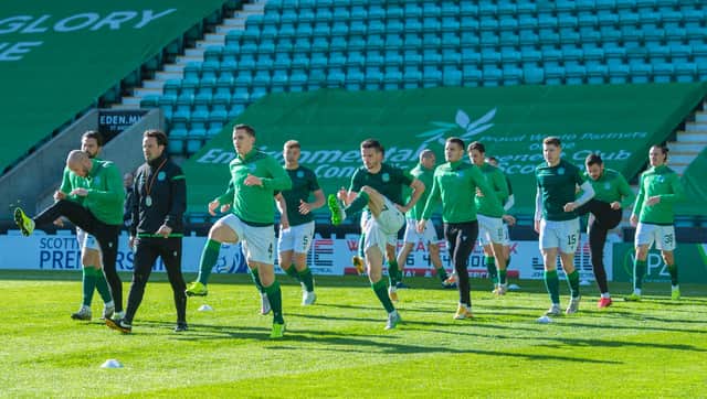 Hibs players warm up ahead of the 2-1 win over Livingston that clinched European football next season. (Photo by Mark Scates / SNS Group)