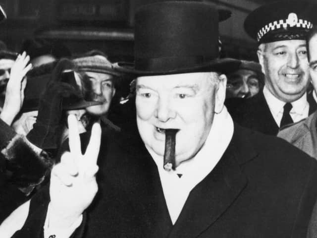 Winston Churchill gives his famous V-sign gesture on the campaign trail   Photo: Keystone/Hulton Archive/Getty Images