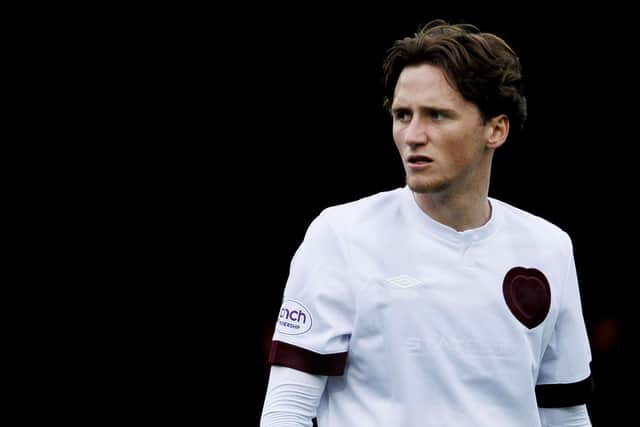 Alex Lowry helped Hearts to victory after coming on as substitute against Ross County. Pic: SNS