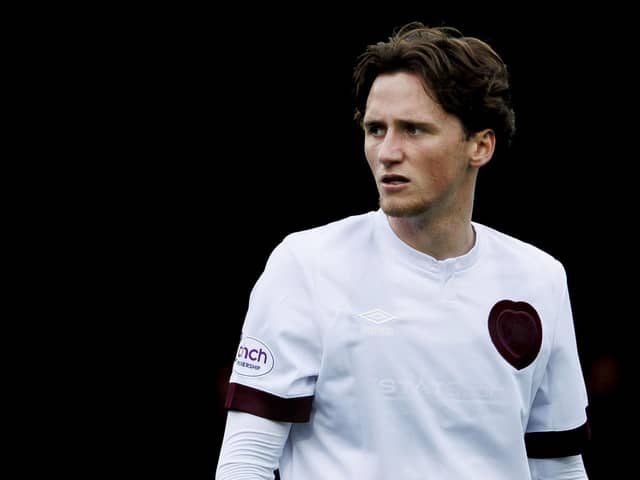 Alex Lowry helped Hearts to victory after coming on as substitute against Ross County. Pic: SNS