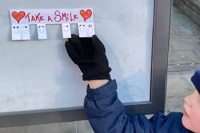 Mystery 'Good Samaritan' praised for leaving 'Take a Smile' notes at local bus stop