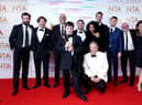 Tommy Jessop (centre), Martin Compston, Gregory Piper, Craig Parkinson, Daniel Mays and the cast and crew of Line of Duty in the press room after winning the Special Recognition Award at the National Television Awards 2021 held at the O2 Arena, London.