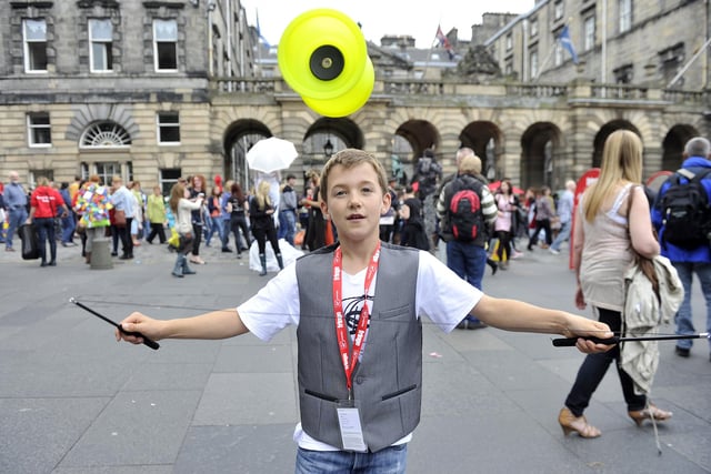Eleven-year-old Matthew Park from Stirling Primary performing as the 'Diablo Wonder' on the Royal Mile during the Edinburgh Festival Fringe in 2011.